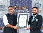 Mr-Anuj-Rustagi-receiving-the-GUINNESS-WORLD-RECRDS-for-creating-the-Longest-Line-of-Chocolate-Bars